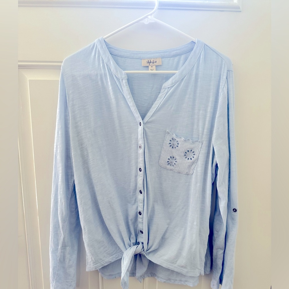 Women’s three-quarter sleeves size medium